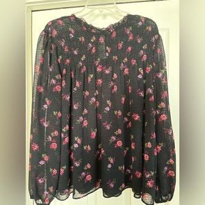 Beautiful black flowing blouse with long sleeves. Worn once.